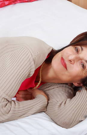 Naughty mature lady playing with herself