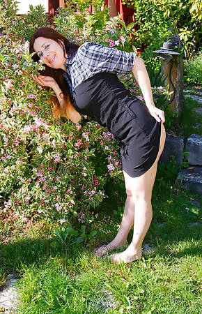 Horny housewife playing in her garden