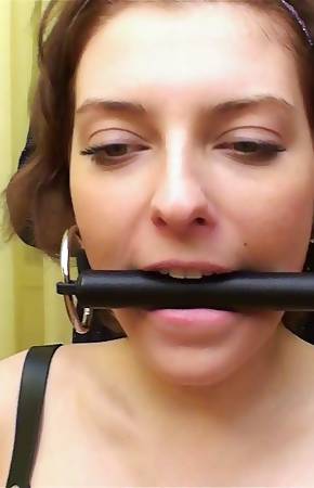 Gagged and bodyharnessed gymnast with big boobs