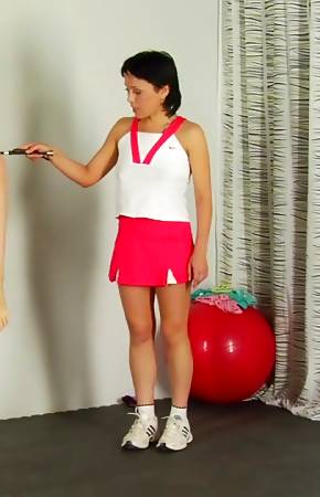 Lesdom coach drilling a bdsm sport brunette