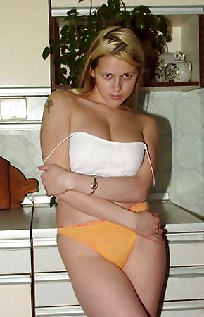 Chubby blonde teen shows big tits