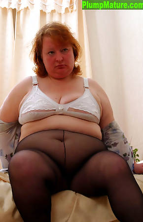 Really big plump posing in black pantyhose