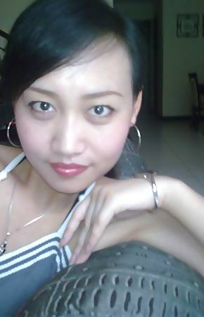 Horny Thai slut enjoys getting banged rough doggystyle