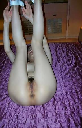 Thai girlfriend with hairy pussy posing and spreading
