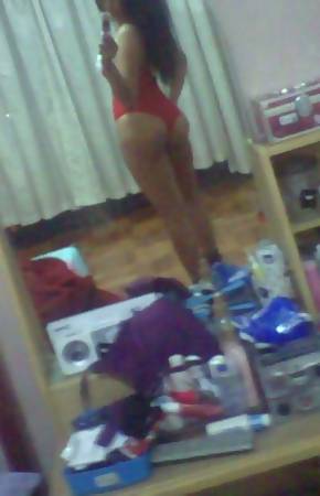 Slutty Filipina hottie being a cocktease in kinky outfit