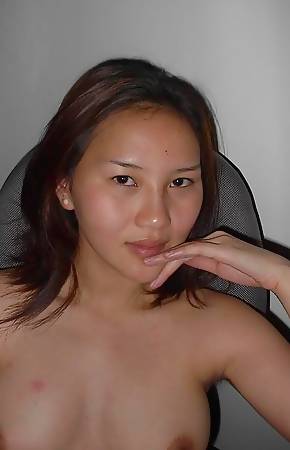 Kinky Asian chick with bushy twat gets banged on the bed