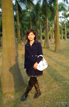 Kinky Korean honey teasing on cam by stripping naked