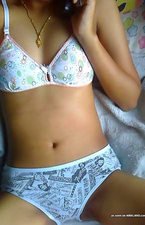 Naughty Asian teen gets wild on cam while spreading