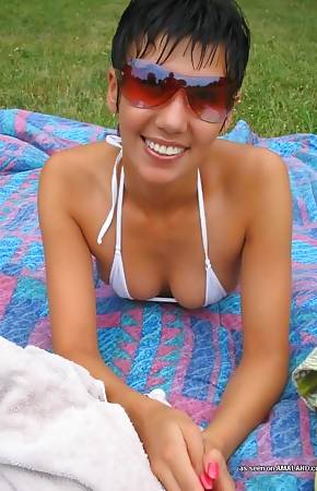 Hot shorthaired Asian GF showing her perky breasts