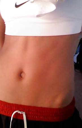 Amateur Asian girlfriend posing naked in her bedroom