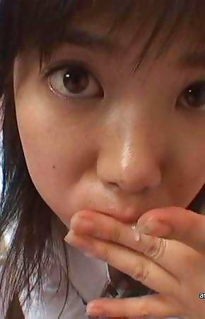 Gallery of a horny Japanese babe sucking on a hard dick