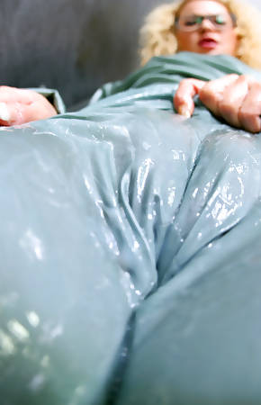 A horny blonde girl is swimming in a ton of thick semen